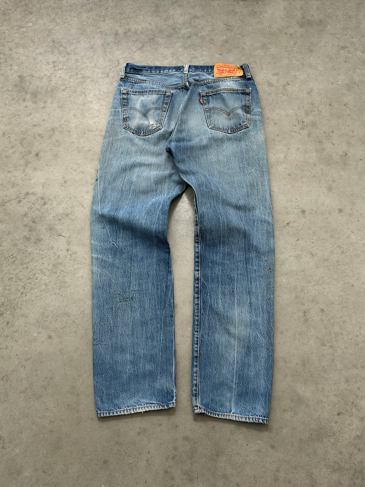DISTRESSED FADED BLUE LEVIS 501 BUTTON FLY JEANS - 2000S