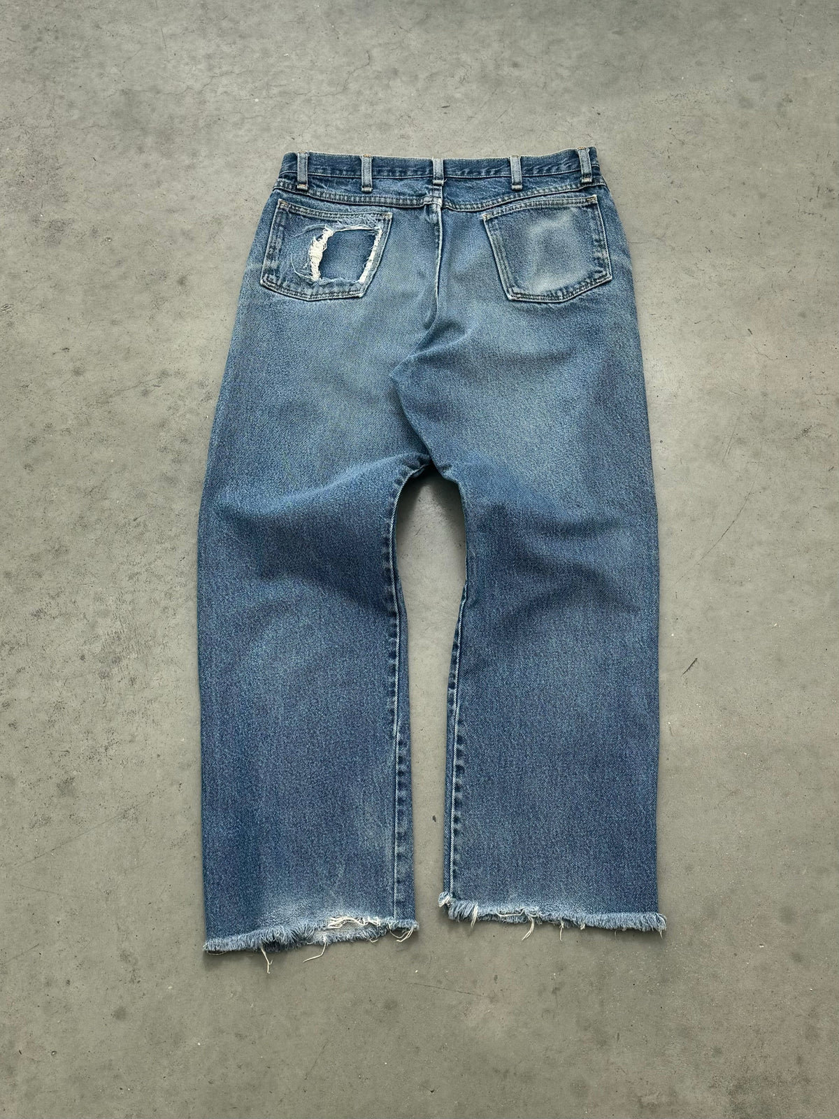 DISTRESSED & FADED BLUE OPEN HEM JEANS - 1990S