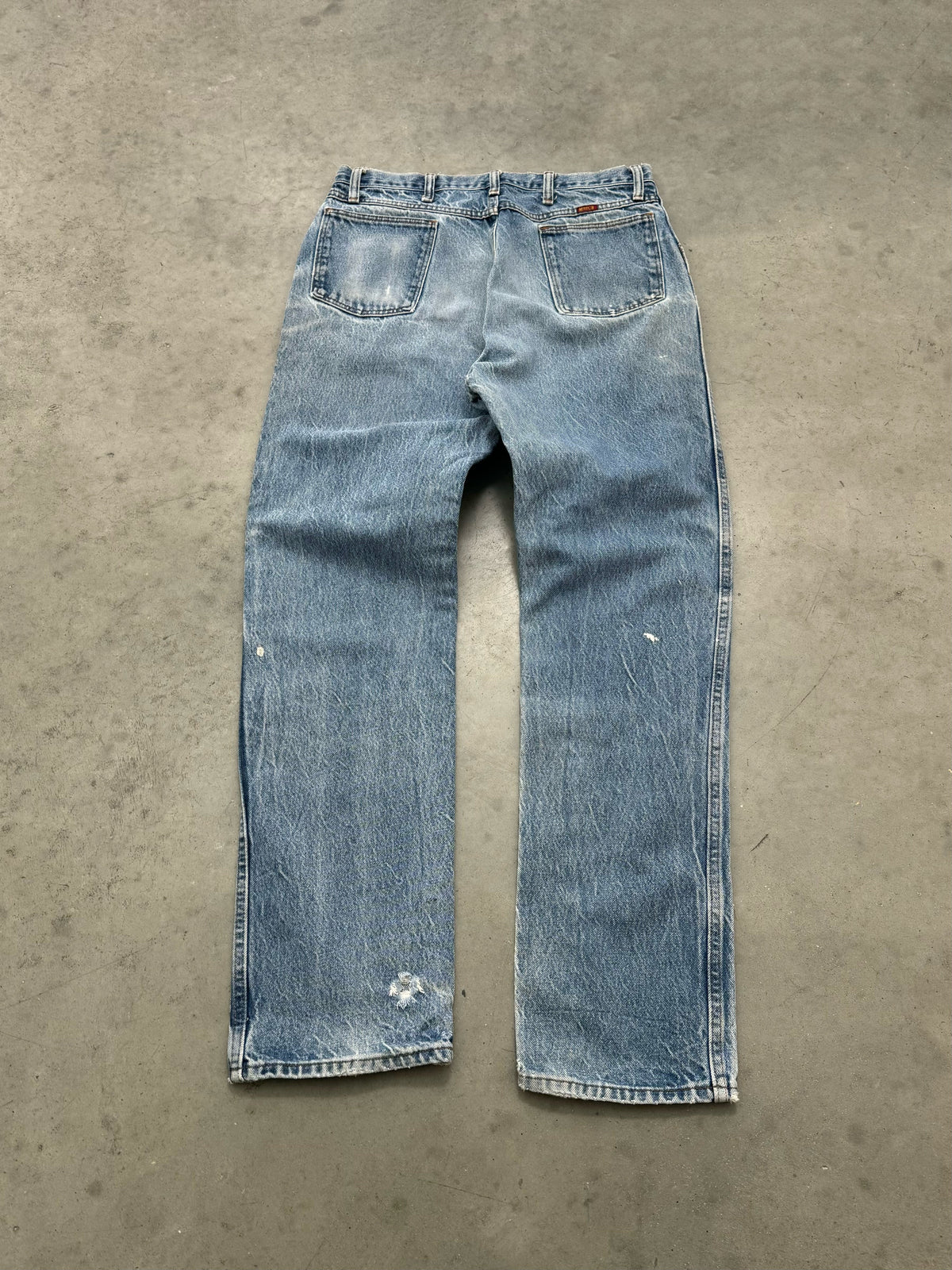 PAINT SPLATTER & FADED BLUE JEANS - 1990S