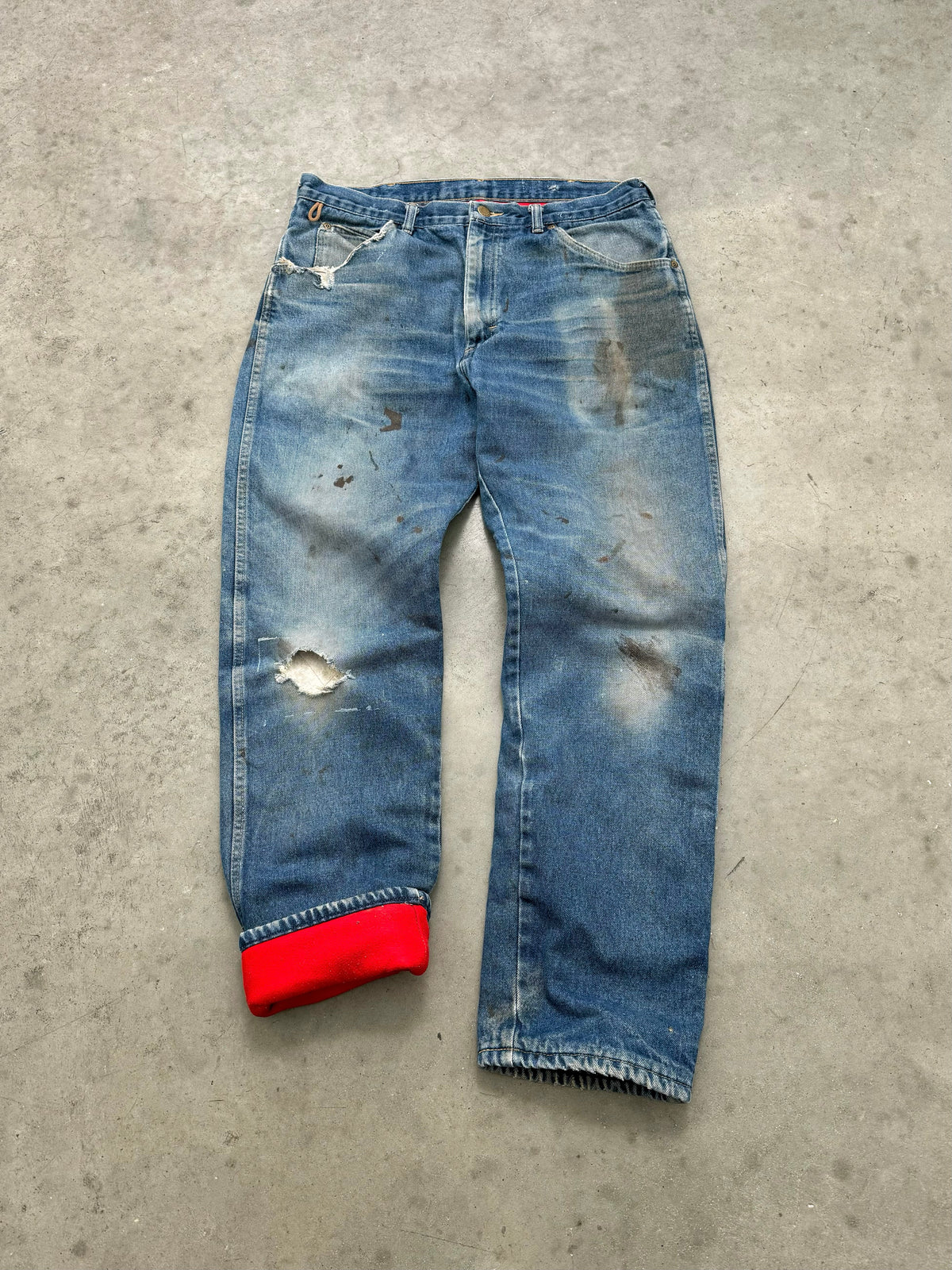 FADED & DISTRESSED RED FLANNEL LINED WRANGLER DENIM - 1980S
