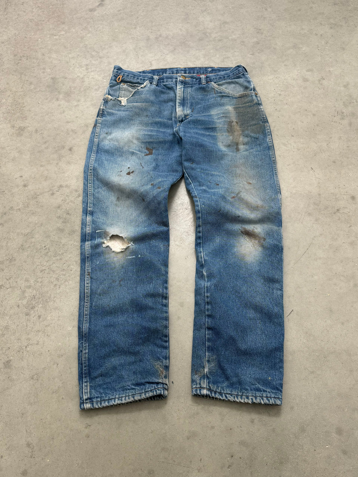 FADED & DISTRESSED RED FLANNEL LINED WRANGLER DENIM - 1980S
