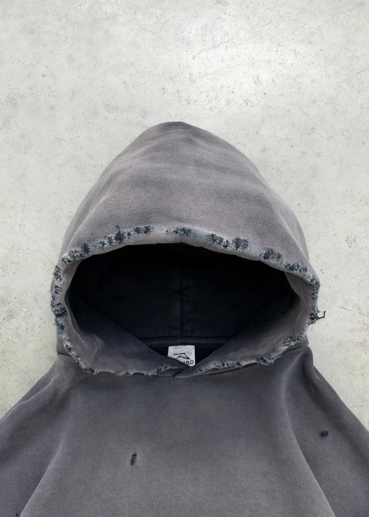 "WATCH-PEEKER" DISTRESSED HOODIE - SUN FADED BLACK