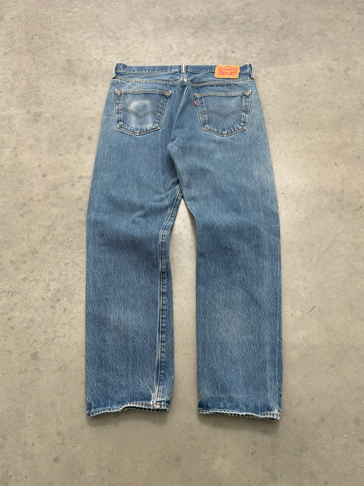 DISTRESSED & FADED BLUE LEVIS PATCHWORK JEANS - 2000S