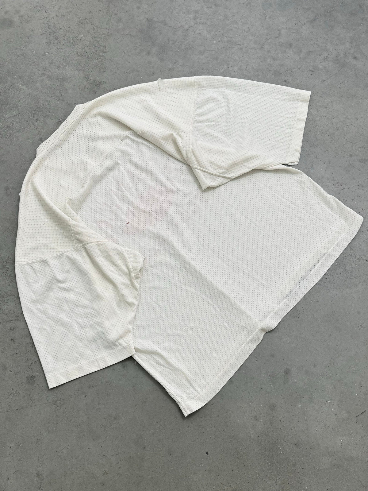 DISTRESSED & FADED WHITE "CASHMERE FOOTBALL" MESH JERSEY - 1980S